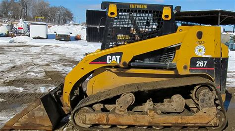 cat 267 track adjustment